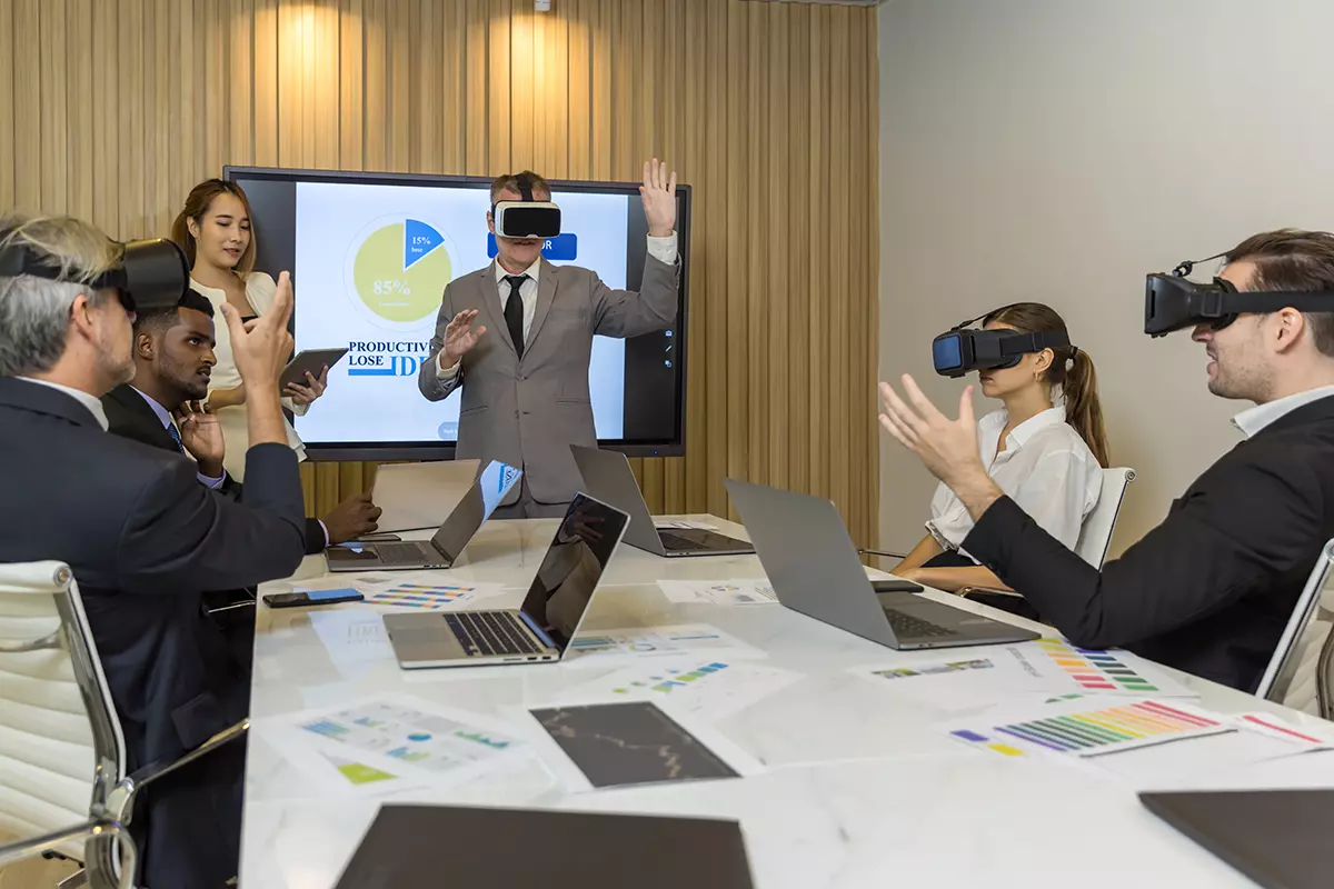 Exploring The Future Of Video Conferencing: Virtual Reality And Beyond business persons with virtual reality headsets in 1200x800 1