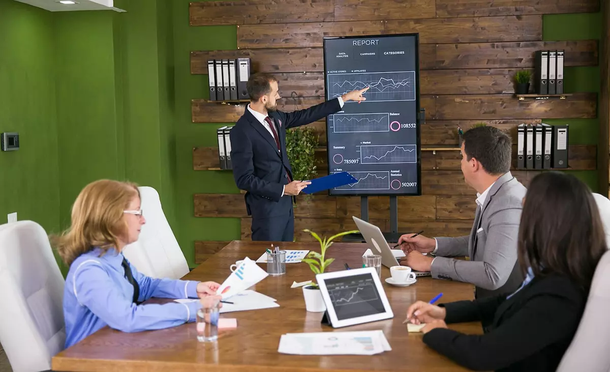 businessman suit having presentation with charts tv screen conference rom team meeting 1200