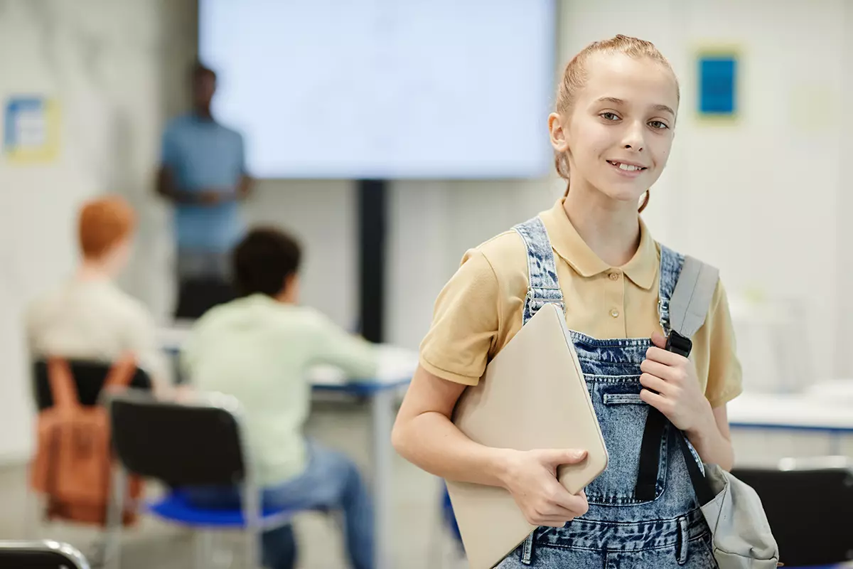 Hybrid Classroom Solutions: The Future Of Education Through Personalized Learning girl in school classroom 1200x800 1