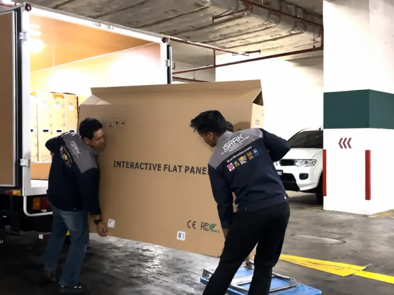 Team Arvia loading Arvia Smartboard AI Kementerian Digital units for delivery