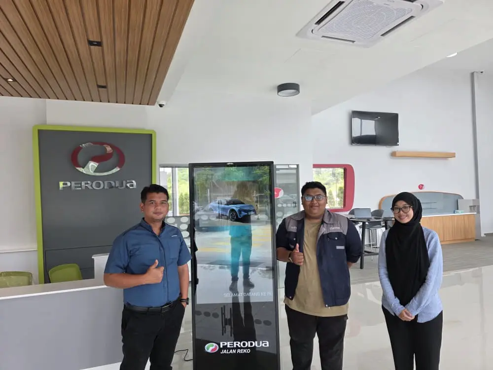 Floor Standing Kiosk For Car Showroom Boosts Perodua Jalan Reko Israk Solutions team with Perodua Jalan Reko staff after floor standing kiosk installation in Kajang, Selangor