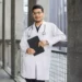 male indian arab doctor standing outdoors 600x600 1