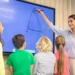 teacher and student using smartboard in classroom001