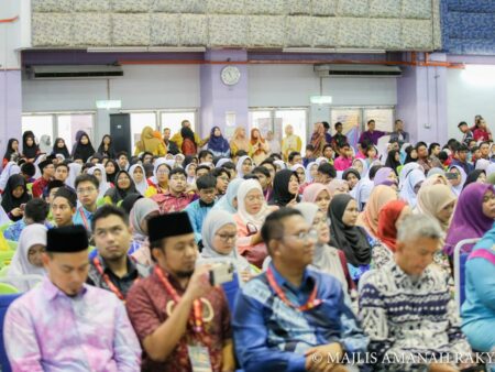 teacher-students-and-audience-watching-debate-event